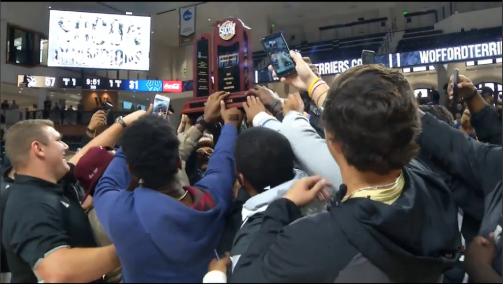 The Wofford Football team was presented their 2017 SoCon Football Championship trophy on Sunday during halftime of the men's basketball game.